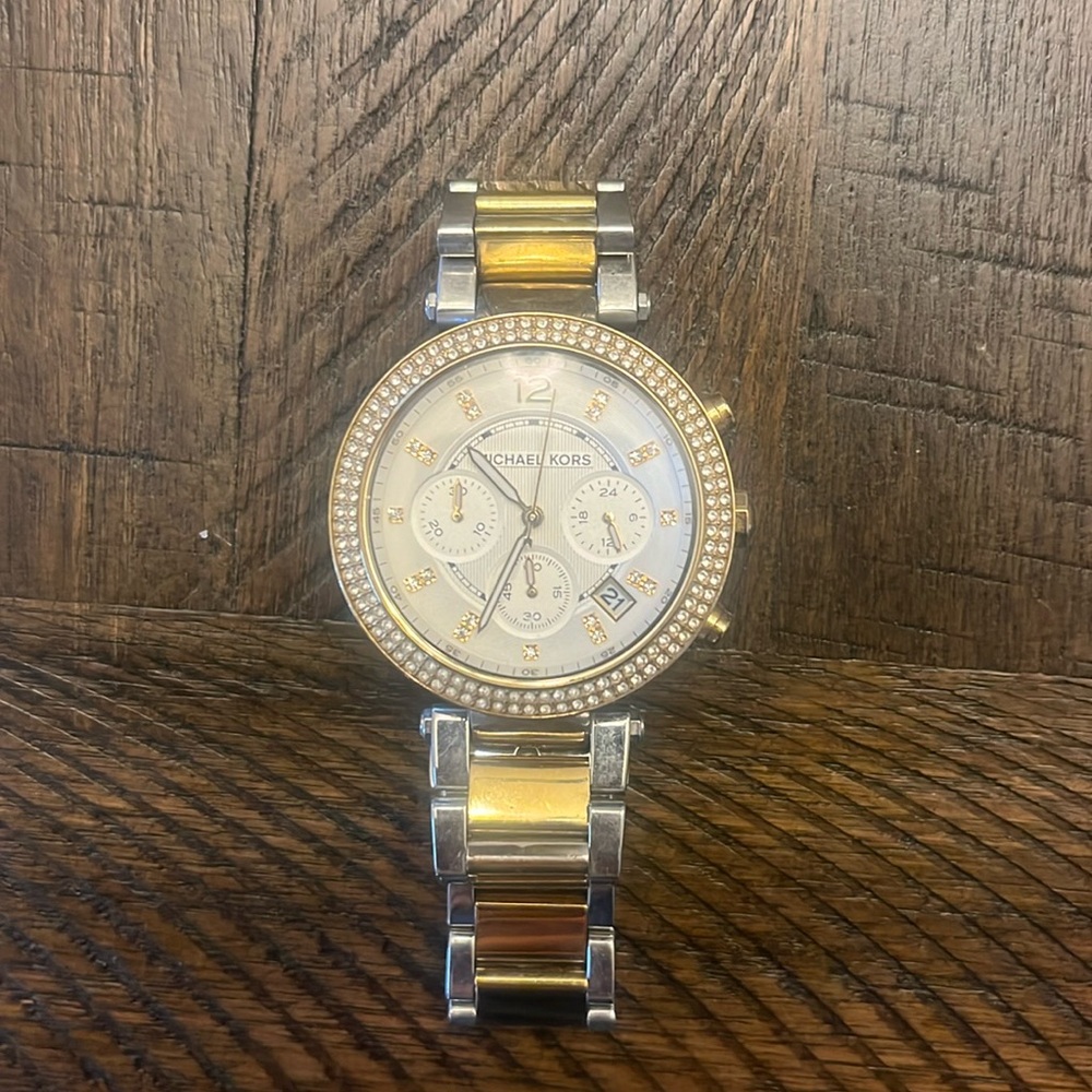 Women's Michael Kore two-toned watch.